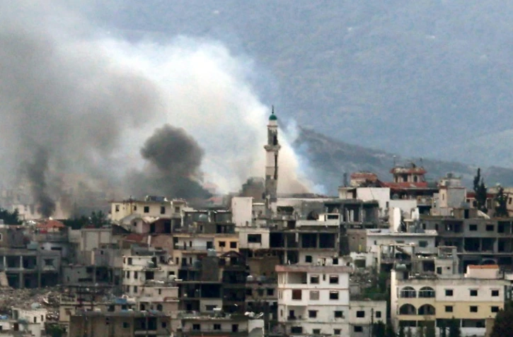 De la fumée s'élève au-dessus du village de Khiam, dans le sud du Liban, après une frappe israélienne le 28 mars 2025