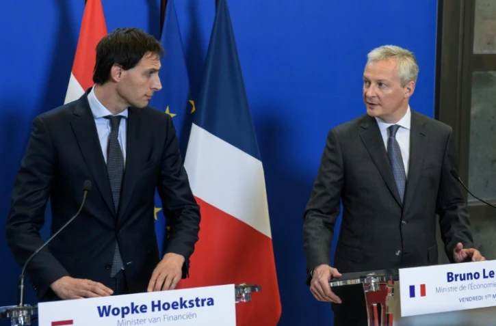Le ministre de l'Economie Bruno Le Maire (d) et son homologue Wopke Hoekstra (g) lors d'une conférence de presse à Paris, le 1er mars 2019