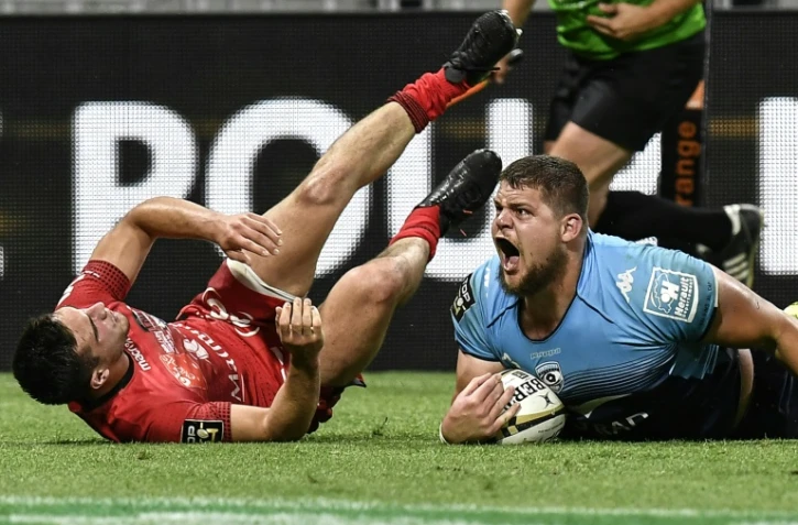 Le 2e ligne de Montpellier Paul Willemse exulte après avoir inscrit un essai contre le LOU, le 25 mai 2018 à Lyon