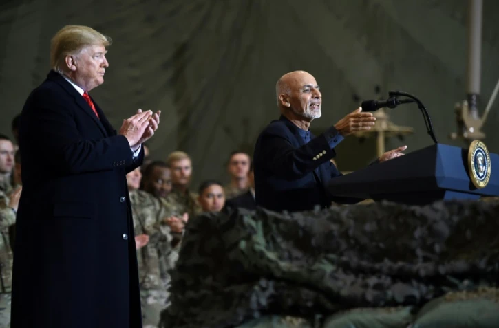 Le président américain avec le président afghan Ashraf Ghani, lors d'une visite surprise sur la base américaine de Bagram, en Afghanistan, le 28 novembre 2019