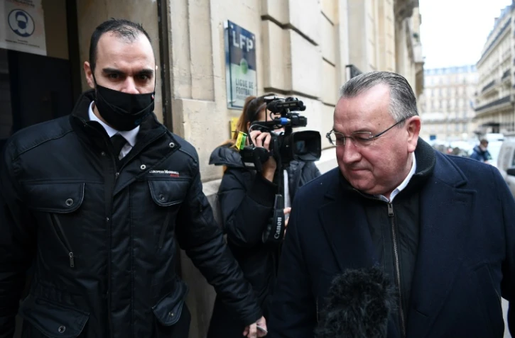 Le président du Stade de Reims, Jean-Pierre Caillot (d), à son arrivée à la Ligue de football professionnel (LFP) à Paris, le 1er février 2021