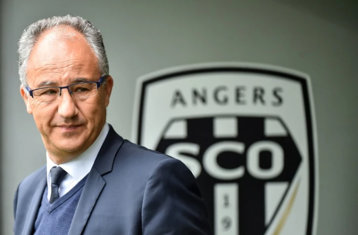 Le président du club de football d'Angers, Saïd Chabane, pose au siège du club, le 28 avril 2019 à Angers 