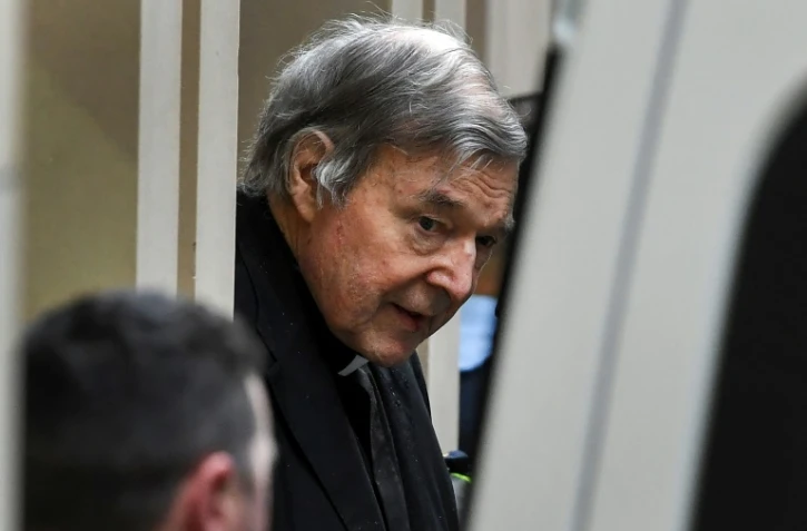 Le cardinal George Pell quitte menotté la Cour suprême de l'Etat de Victoria à Melbourne après avoir perdu son procès en appel, le 21 août 2019