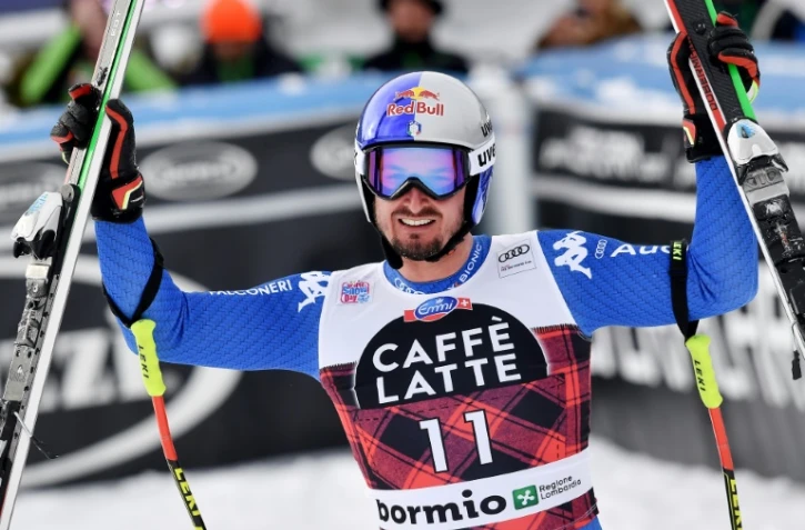 La joie de l'Italien Dominik Paris dans l'aire d'arrivée après sa victoire dans la descente de Bormio, le 28 décembre 2018