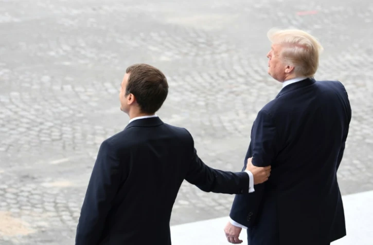 Le président français Emmanuel Macron et le président américain Donald Trump sur les Champs Elysées à paris le 14 juillet 2017