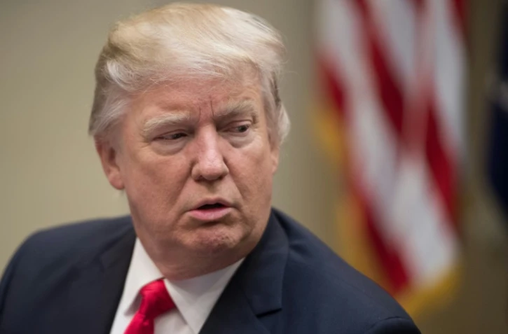 Donald Trump dans le bureau oval de la Maison Blanche le 30 janvier 2017 à Washington