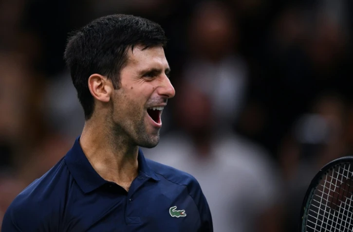 Novak Djokovic exulte à l'issue de sa finale gagnée contre le Canadien Denis Shapovalov au tournoi Masters 1000 de Paris, le 3 novembre 2019