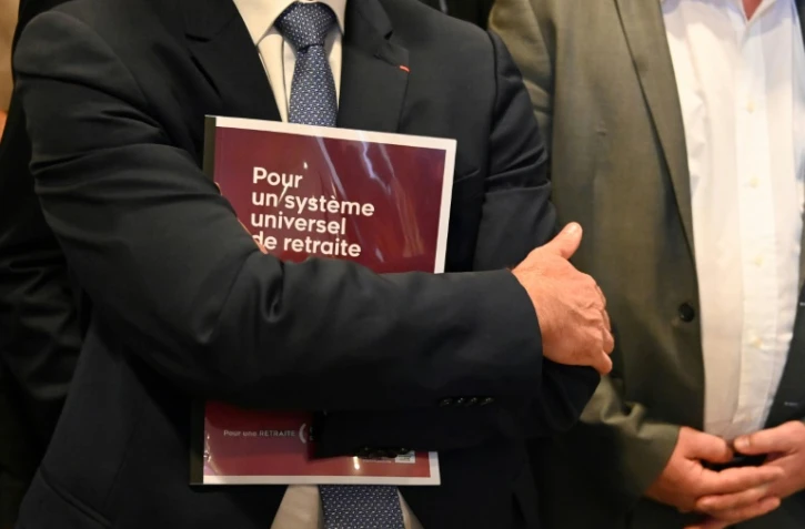 Un participant à la réunion sur la réforme des retraites à Paris le 18 juillet 2019