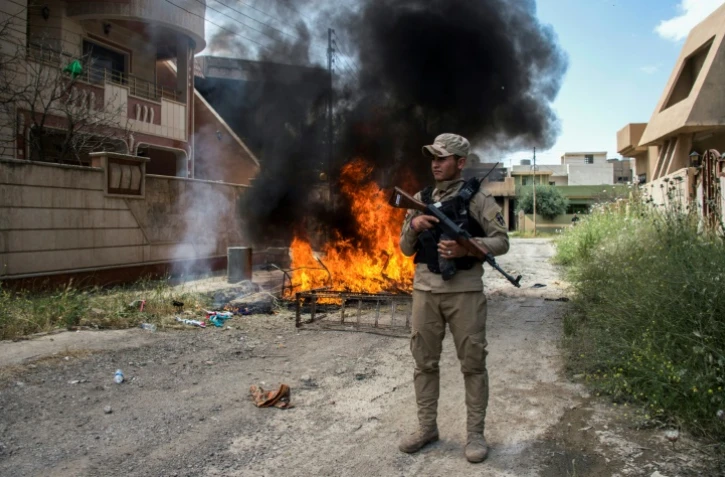 Un membre des milices chrétiennes à Qaraqosh, en Irak, le 5 mai 2017