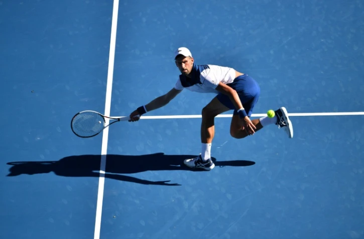 Le Serbe Novak Djokovic face à Gaël Monfils au 2e tour de l'Open d'Australie, à Melbourne, le 18 janvier 2018