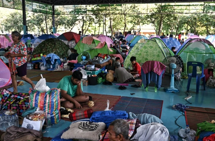 Des habitants déplacés dans un centre d'hébergement de la province de Surin, le 11 décembre 2025 en Thaïlande, lors d'affrontements à la frontière avec le Cambodge