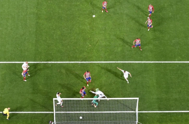 Le défenseur du Real Sergio Ramos ouvre le score face à l'Atletico, en finale de la Ligue des champions, le 28 mai 2016 à San Siro