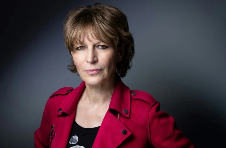 La secrétaire générale de l'ONG Amnesty International, Agnès Callamard, pose lors d'une séance photo dans son bureau à Paris le 6 avril 2021.