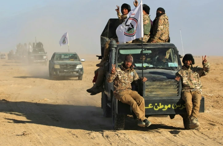 Les forces irakiennes, appuyées par les forces paramilitaires du Hachd al-Chaabi, avancent dans la province de Salaheddine, après avoir quitté la ville de Baiji, le 24 novembre 2017