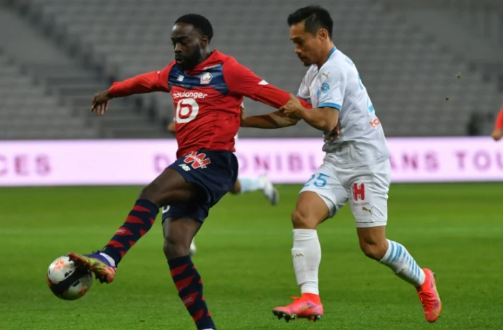 Le milieu canadien de Lille, Jonathan David (g), auteur d'un doublé lors du match de Ligue 1 à domicile contre Marseille, le 3 mars 2021