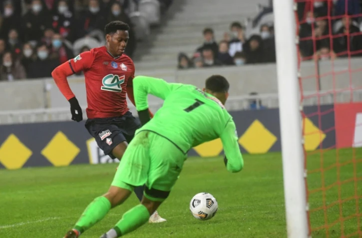 L'attaquant canadien Jonathan David marque le 2e but lillois face à Auxerre, lors des 32e de finale de la Coupe de France, le 18 décembre 2021 au Stade Pierre-Mauroy à Villeneuve-d'Ascq