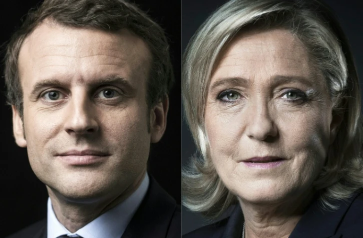 Combo réalisé le 3 avril 2017 des deux candidats en tête des sondages de la présidentielle, Emmanuel Macron, le candidat d'En marche! (G) et la présidente du Front national Marine Le Pen.
