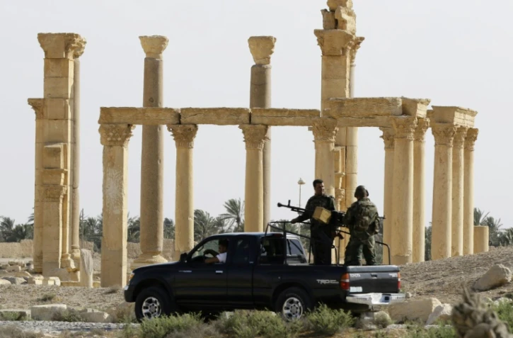 L'armée syrienne en patrouille le 6 mai 2016 à Palmyre