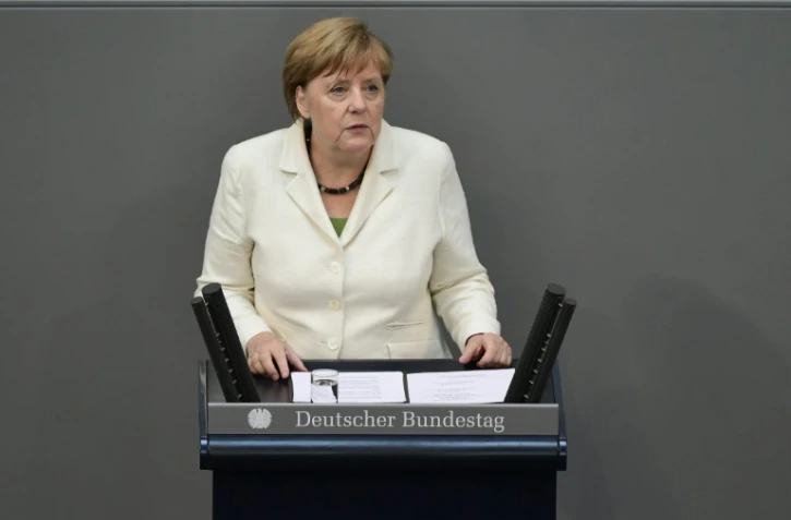 La chancelière Angela Merkel s'exprime devant la chambre basse du Parlement allemand à Berlin lors d'une session spéciale consacrée au Brexit le 28 juin 2016