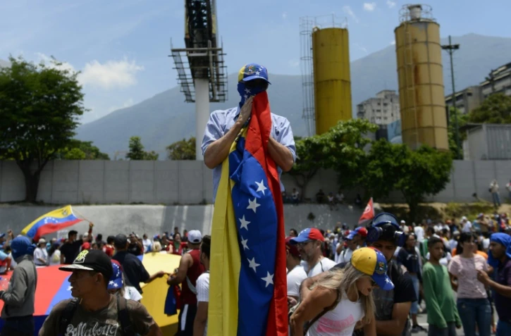 Manifestants anti-gouvernementaux le 1er Mai à Caracas