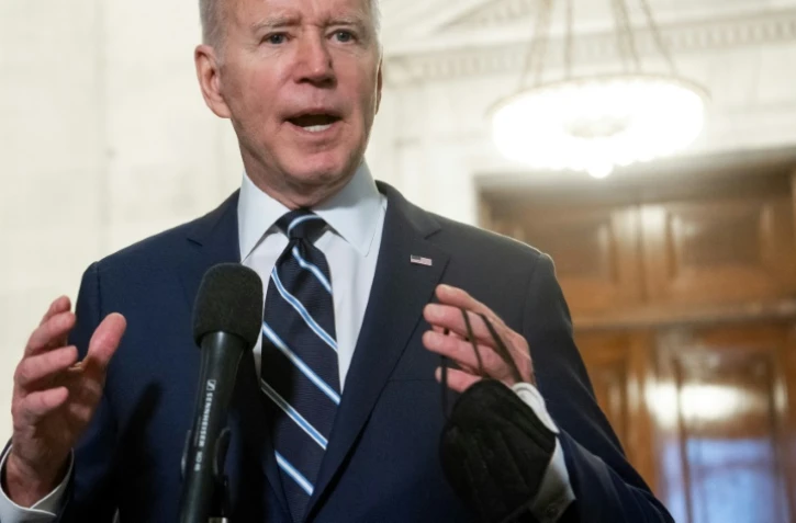 Le président américain Joe Biden s'exprime devant les journalistes au Congrès, le 13 janvier 2022