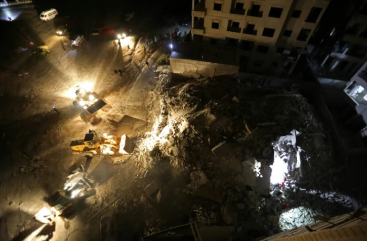 Décombres d'un immeuble qui s'est effondré après des frappes du régime syrien à Idleb, dans le nord-ouest du pays, le 4 février 2018

