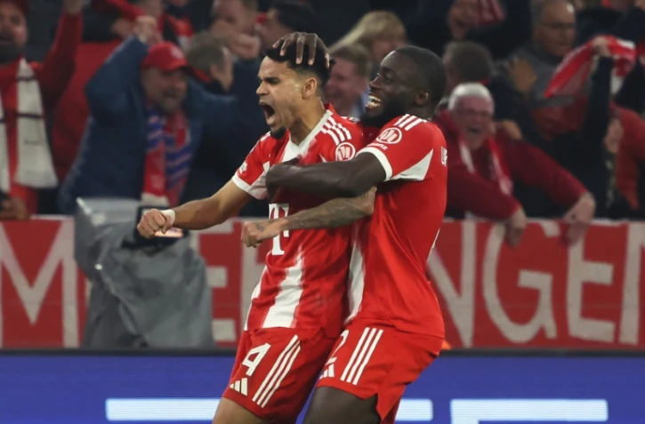 Luis Diaz, auteur du troisième but du Bayern, et Dayot Upamecano exultent face au Real Madrid, le 15 avril 2026 à Munich