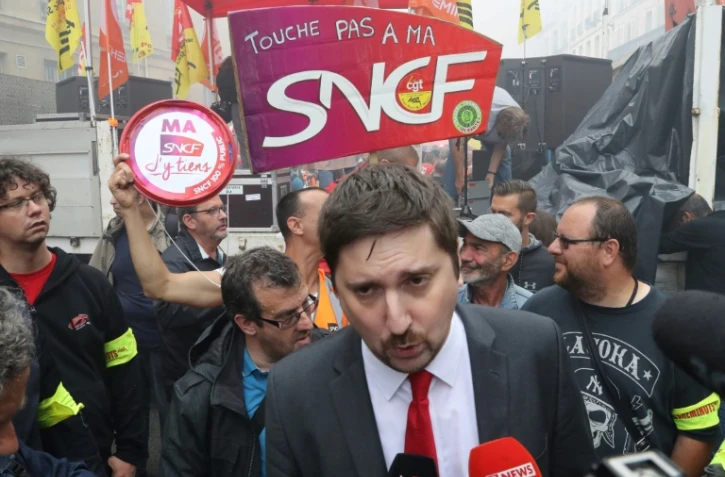 Laurent Brun (c), représentant de la CGT-Cheminots, lors d'une manifestation à Paris contre la réforme ferroviaire en mai 2018
