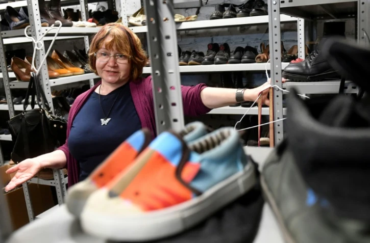 Galina Artiomenko récoltait des fonds pour aider les Ukrainiens déplacés en Russie à cause de l'offensive de février 2022, à Saint-Pétersbourg, le 28 juillet 2023