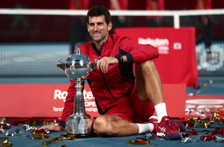 Le Serbe Novak Djokovic célèbre sa victoire au tournoi du Japon, à Tokyo, le 6 octobre 2019