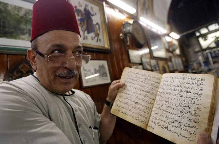 Le Syrien Ahmad al-Lahham, un des derniers conteurs, dans un café de Damas, le 19 juin 2017