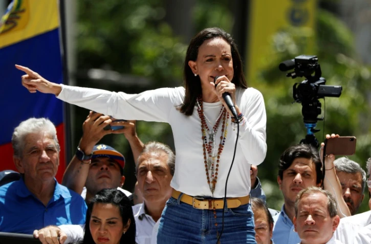 Maria Corina Machado (c), leader de l'opposition vénézuélienne, lors d'un rassemblement à Caracas, le 28 août 2024
