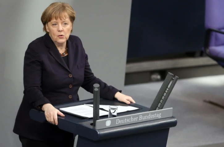 La chancelière allemande Angela Merkel s'adresse au Bundestag, le 17 février 2016 à Berlin, avant la réunion du Conseil européen à Bruxelles
