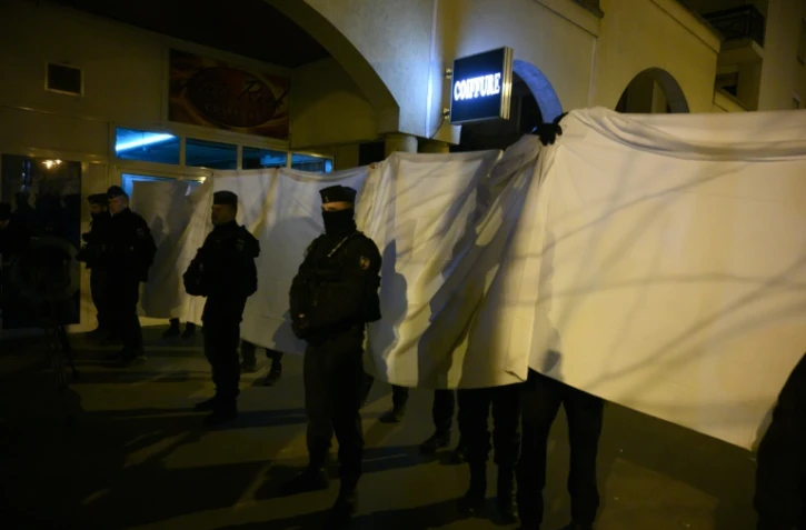 Reconstitution du meurtre d'Arthur Noyer en présence du suspect Nordahl Lelandais, dans une rue de Chambéry au début du 21 mars 2019
