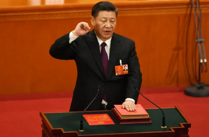 Le président chinois Xi Jinping prête serment après avoir été réélu, le 17 mars 2018 à Pekin