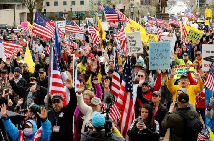 Une manifestation pour la réouverture économique le 30 avril 2020 à Lansing (Michigan)