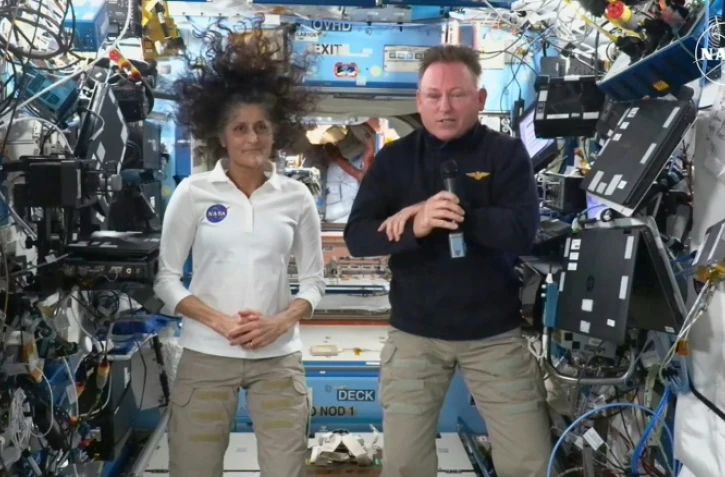 Les astronautes de la Nasa Butch Wilmore et Suni Williams lors d'une conférence de presse depuis la Station spatiale internationale (ISS) le 13 septembre 2024