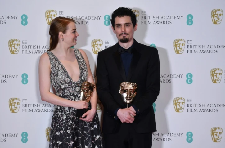 L'actrice américaine Emma Stone et le réalisteur de 'La La Land' Damien Chazelle le 012 février 2017 à Londres