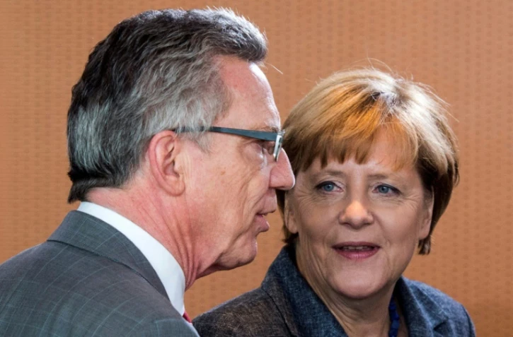 Angela Merkel et son ministre de l'Intérieur, Thomas de Maizière, à Berlin le 15 septembre 2015