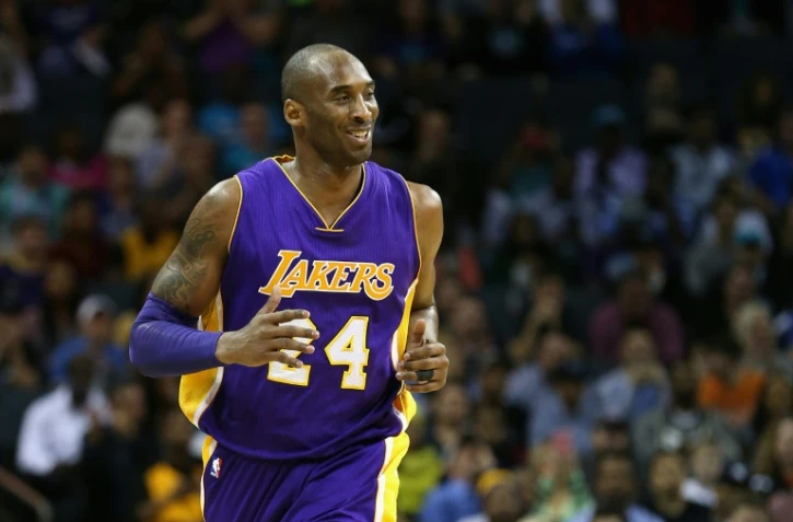 La star des Los Angeles Lakers, Kobe Bryant, lors du match de NBA contre les Charlotte Hornets, le 28 décembre 2015 à Charlotte (Caroline du nord)