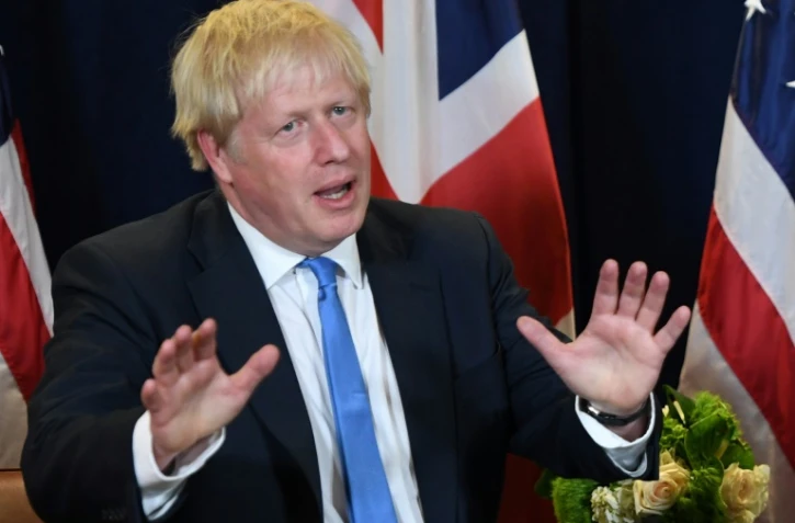 Boris Johnson réagit devant les médias après la décision de la Cour suprême, le 24 septembre au siège des Nations unies, à New York.