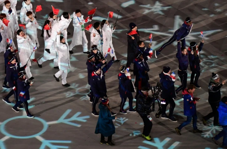 La délégation française (d) défile lors de la cérémonie de clôture des JO de Pyeongchang, le 25 février 2018