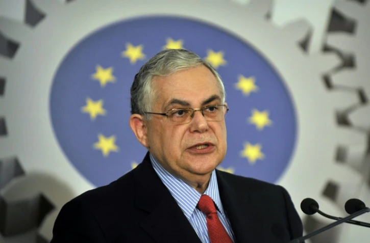 L'ex-Premier ministre grec Lucas Papademos, s'exprime lors d'une conférence à Athènes le 20 avril 2012
