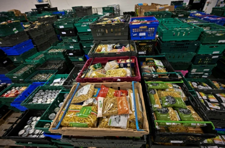 Des produits alimentaires donnés à la banque alimentaire de la Trussell Trust, le 20 janvier 2022 à Colchester, à l'est de Londres