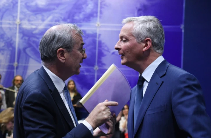 Le gouverneur de la Banque de France Francois Villeroy de Galhau et le ministre de l'Economie Bruno Le Maire, lors d'une conférence à Paris le 16 juillet 2019