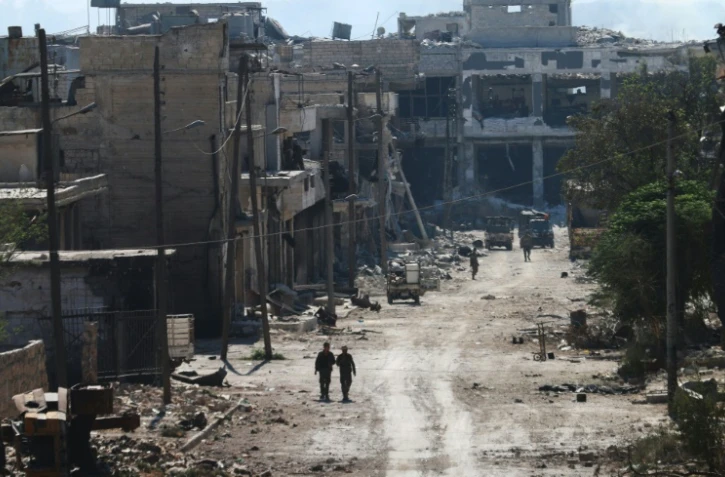 Des combattants pro-régime dans les faubourgs d'Alep, le 9 septembre 2016