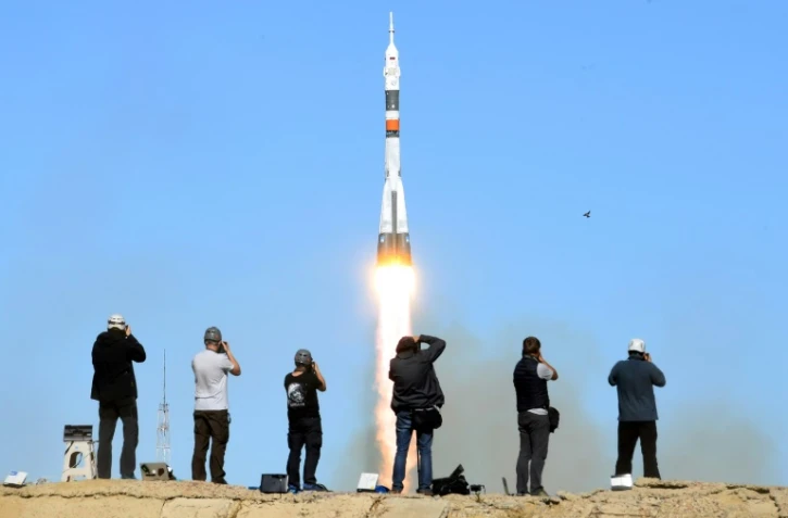 Des photographes prenant des photos du décollage de Soyouz le 11 octobre 2018 sur le cosmodrome de Baïkonour.