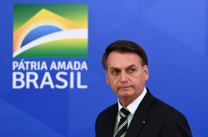 Le président brésilien Jair Bolsonaro à Brasilia pour une conférence de presse, le 24 avril 2020