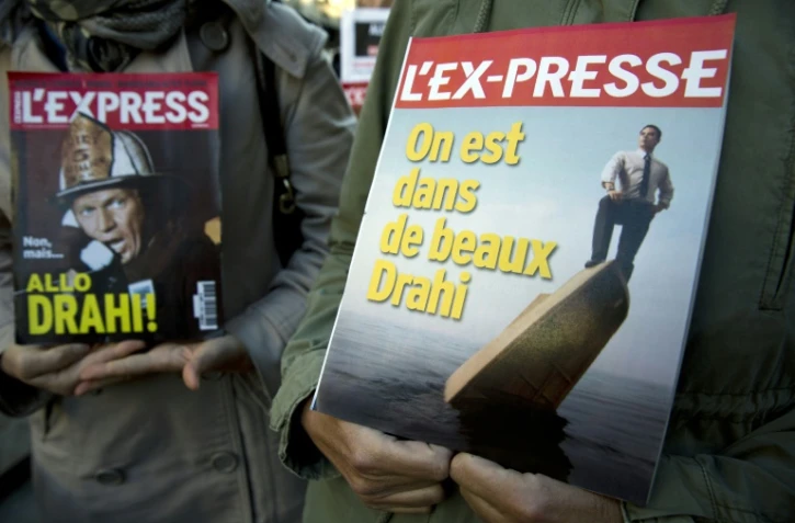 Les salariés de L'Express, L'Expansion et L'Etudiant manifestent contre un plan social révélé par Patrick Drahi, le 2 octobre 2015 à Paris