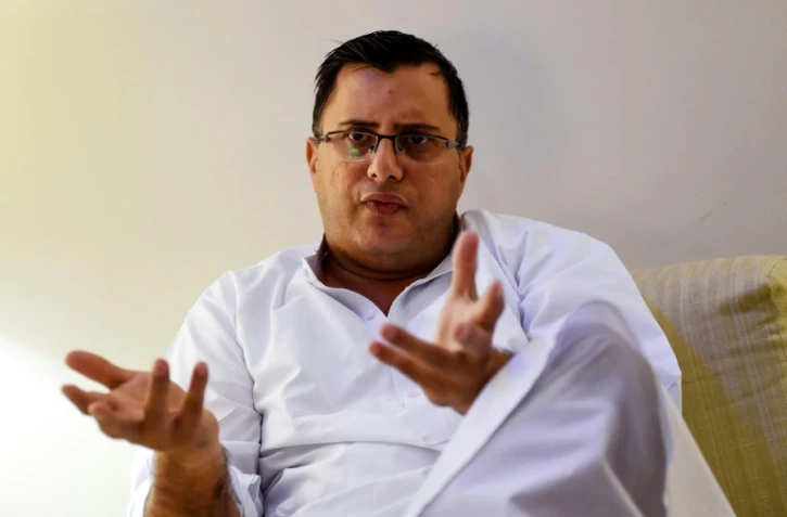 Le policier pakistanais et auteur de polars Omar Shahid Hamid, lors d'une interview Ă Karachi, le 21 mai 2019.